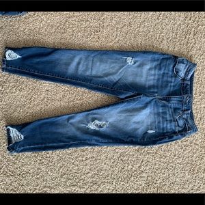 Maurice s size medium distressed jeans.